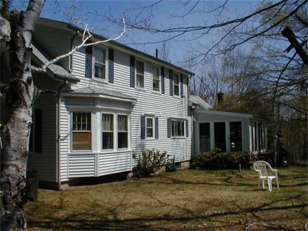 2 Russell Hill Road Ashburnham, MA 01430 - Photo 3 of 18 a front view of a house with garden