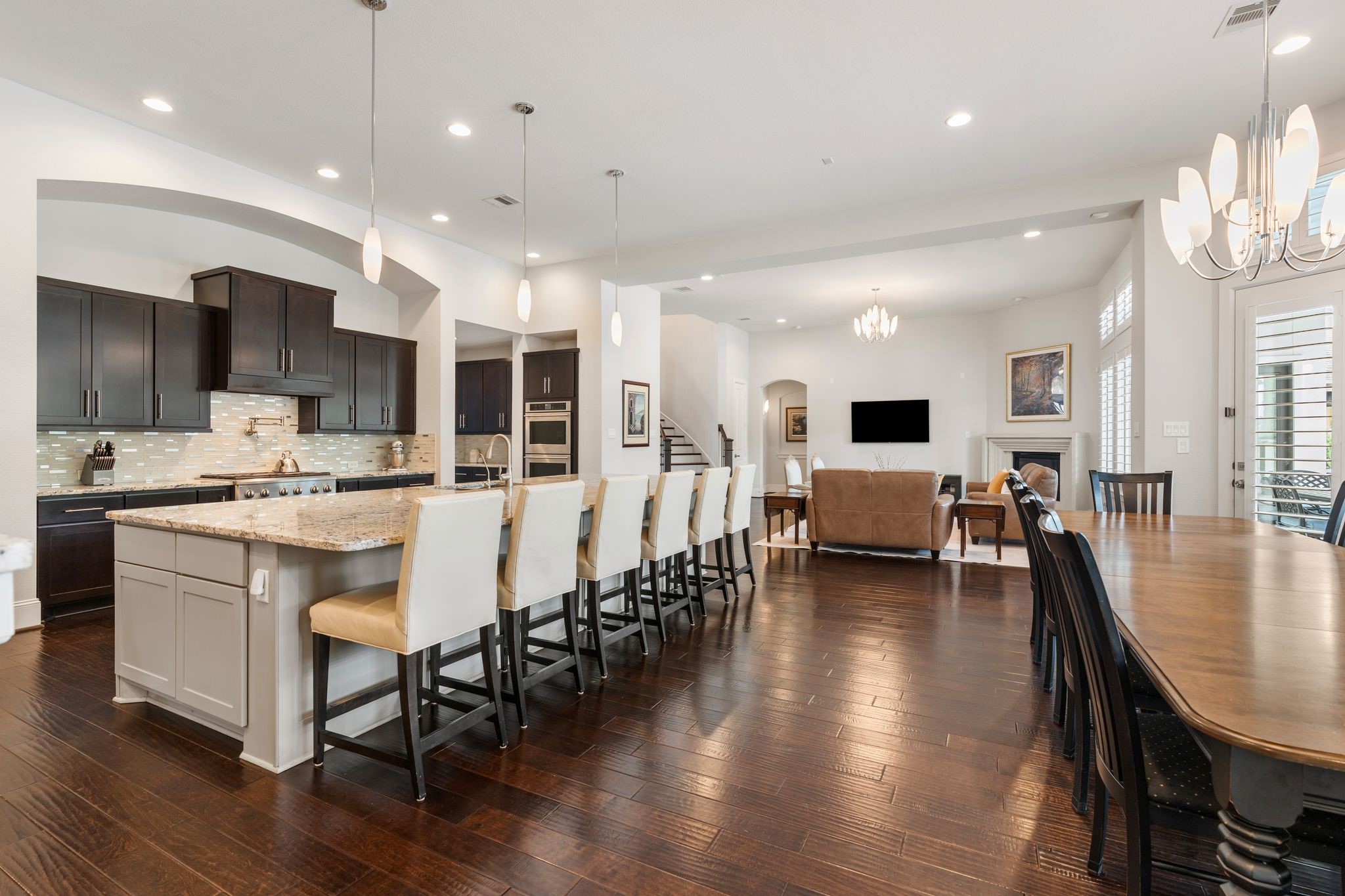 2926 Fairmont Ridge Lane Katy, TX 77494 - Photo 19 of 49 a large kitchen with a table and chairs