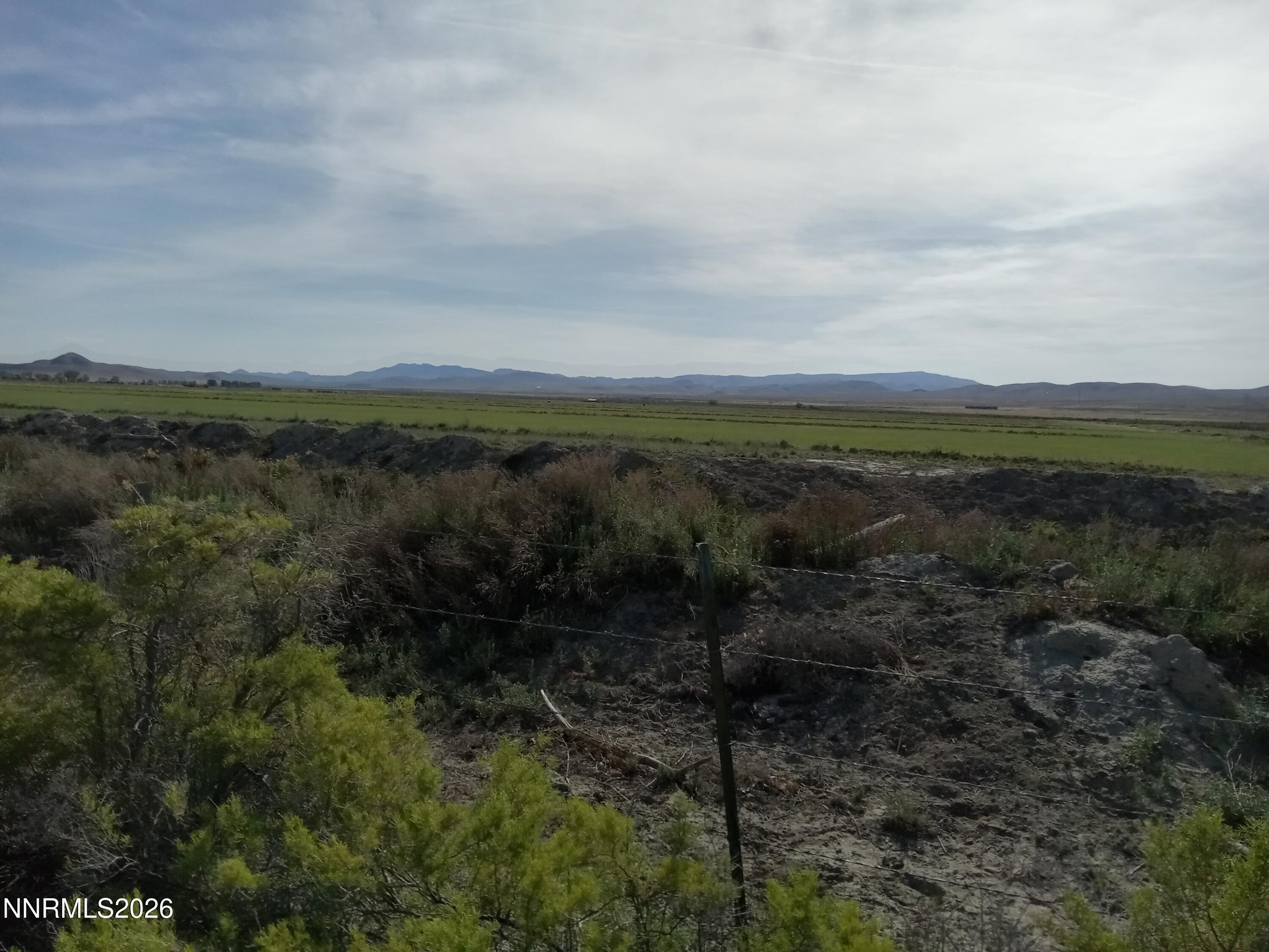 5205 North Meridian Road Lovelock, NV 89419 - Photo 1 of 5 a view of a city with lush green forest