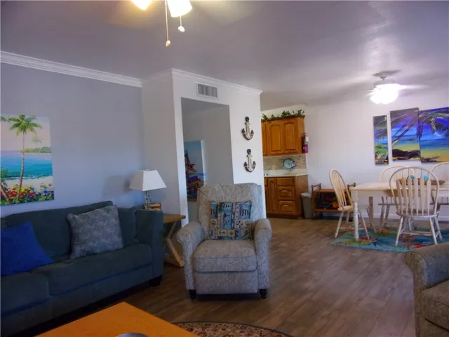 a kitchen with granite countertop a sink and stove