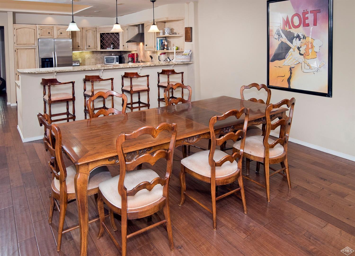 972 Eagle Drive Avon, CO 81620 - Photo 13 of 25 a dining room with furniture and wooden floor