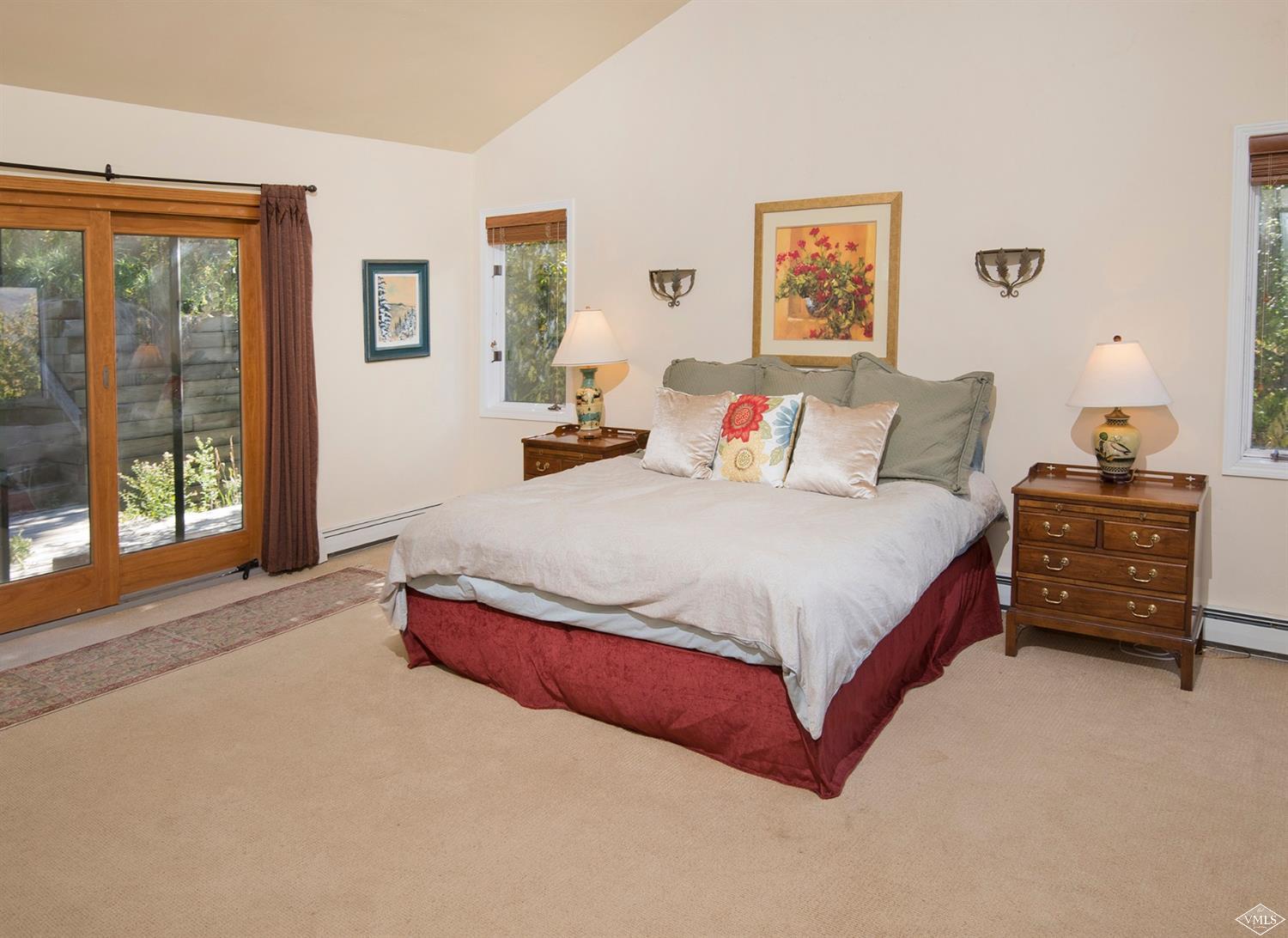 972 Eagle Drive Avon, CO 81620 - Photo 17 of 25 a spacious bedroom with a bed and window
