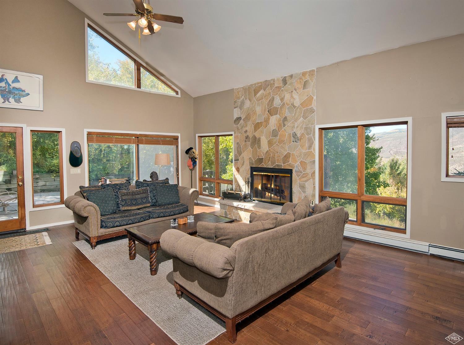 972 Eagle Drive Avon, CO 81620 - Photo 3 of 25 a living room with furniture and a fireplace