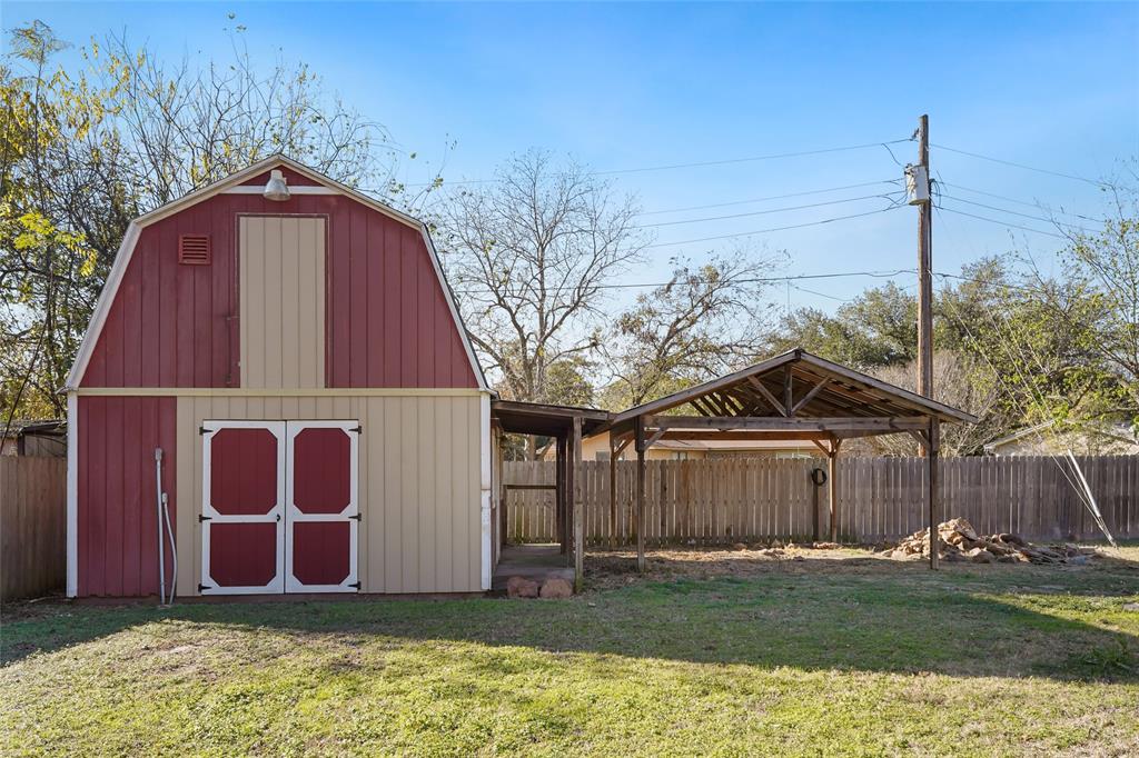 1325 Carter Street Sulphur Springs, TX 75482 - Photo 30 of 31 a front view of a house with garden