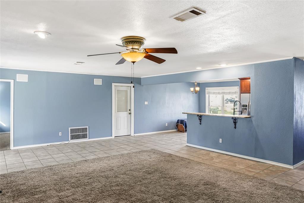 1325 Carter Street Sulphur Springs, TX 75482 - Photo 10 of 31 a view of a kitchen with a sink and cabinets