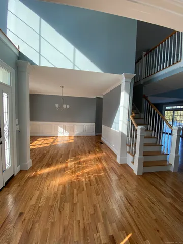 a view of entryway with wooden floor