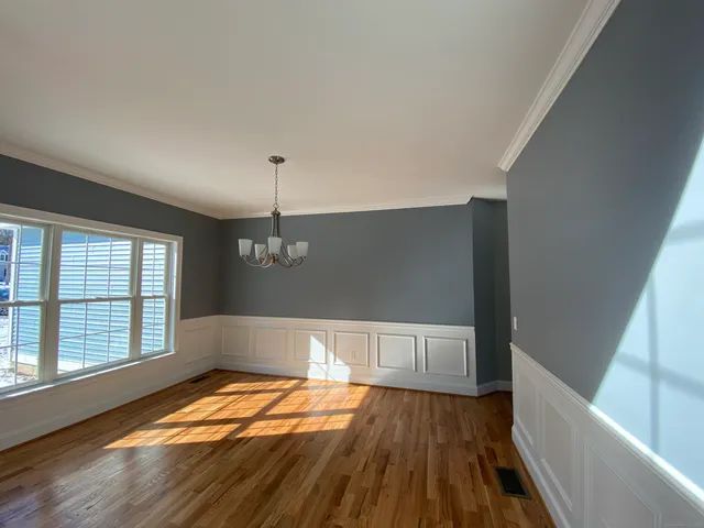 a view of wooden floor and staircase