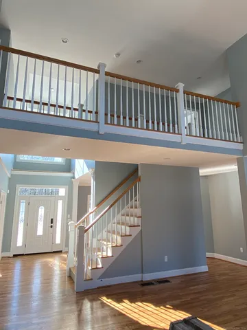 a view of entryway with a front door