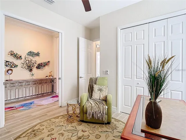 a spacious bedroom with a bed and a couch