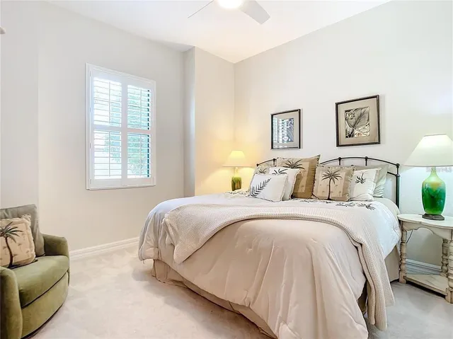 a view of a hallway with wooden floor and front door