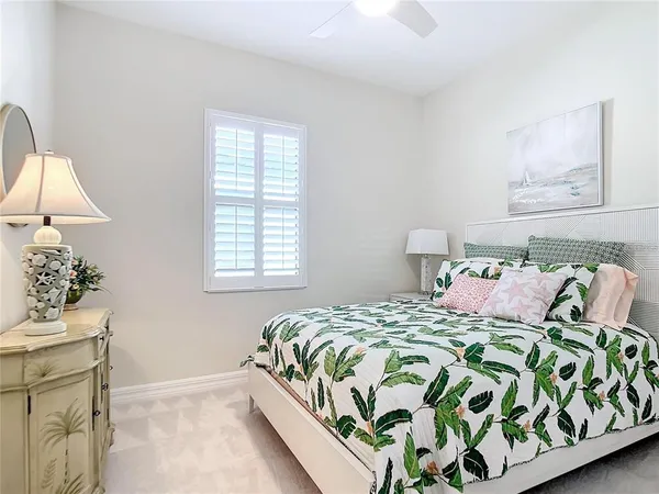 a bedroom with a bed and furniture