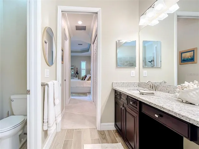 a view of a swimming pool with a yard