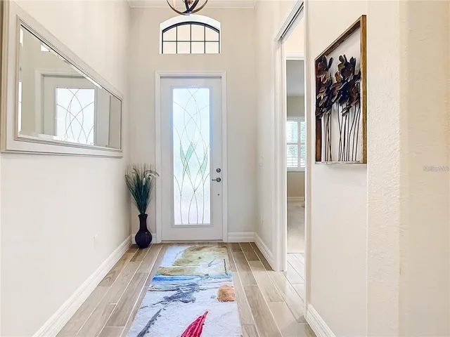 a view of entryway with wooden floor
