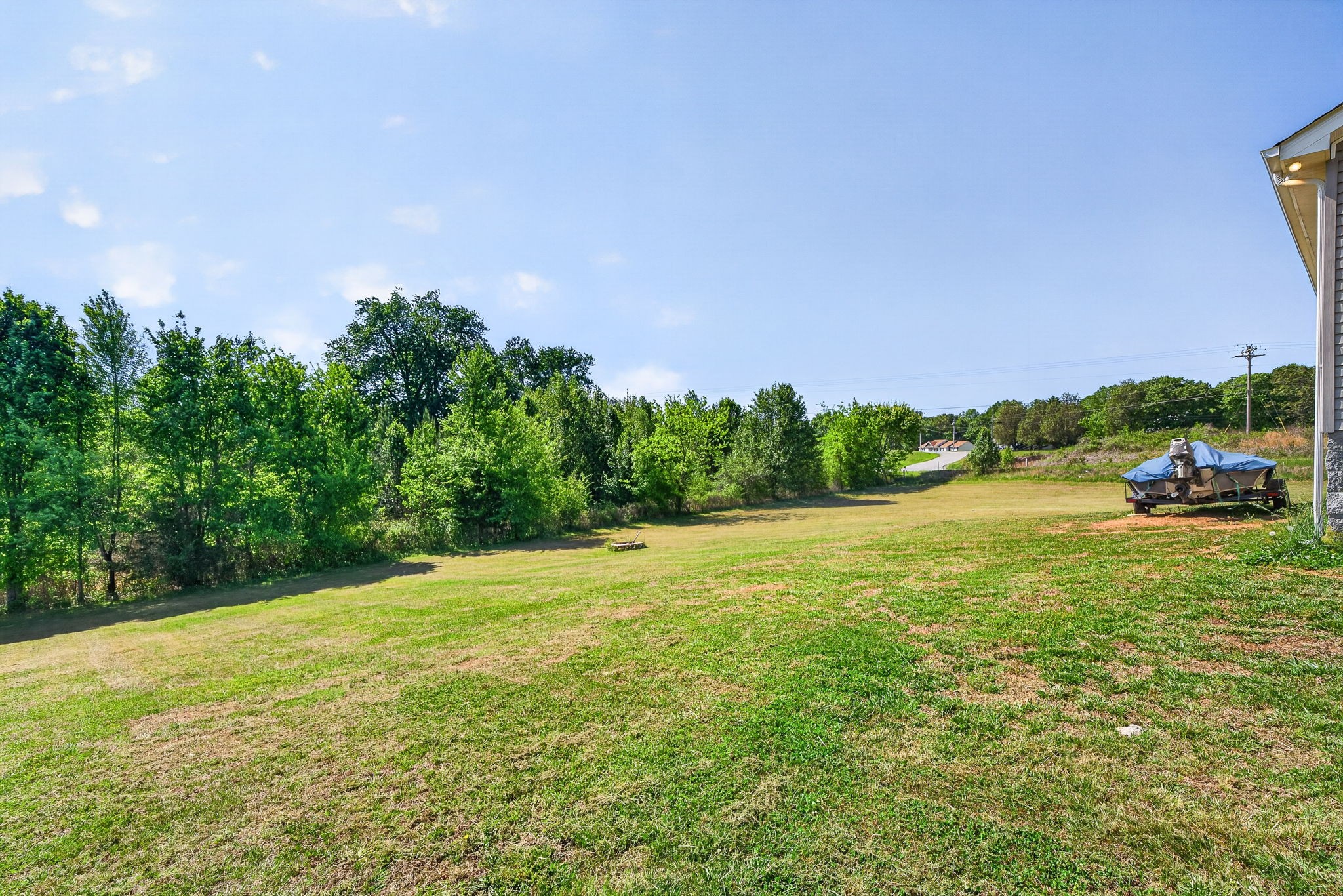 144 Liberty Road Sparta, TN 38583 - Photo 17 of 24 a view of a field with an trees