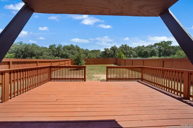 a view of balcony with furniture