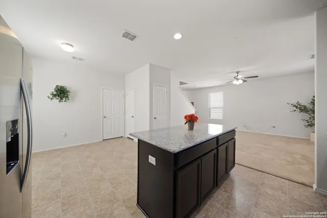 a kitchen with a cabinets and counter space