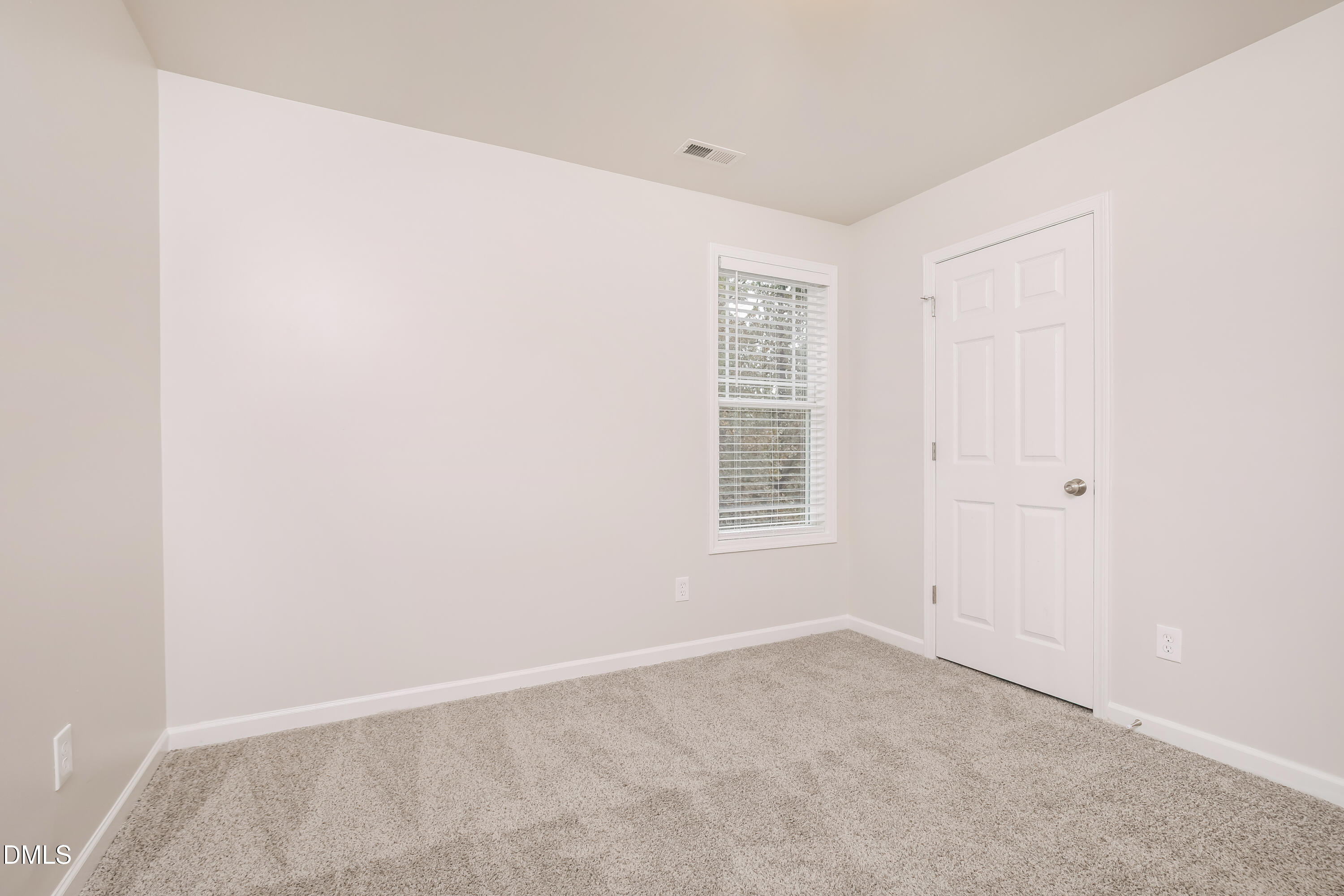 195 Cherryhill Drive Four Oaks, NC 27524 - Photo 11 of 17 an empty room with a window