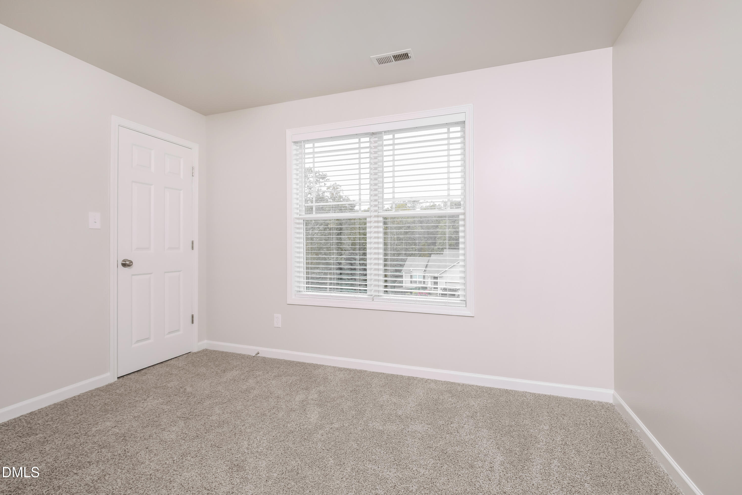 195 Cherryhill Drive Four Oaks, NC 27524 - Photo 12 of 17 an empty room with a window