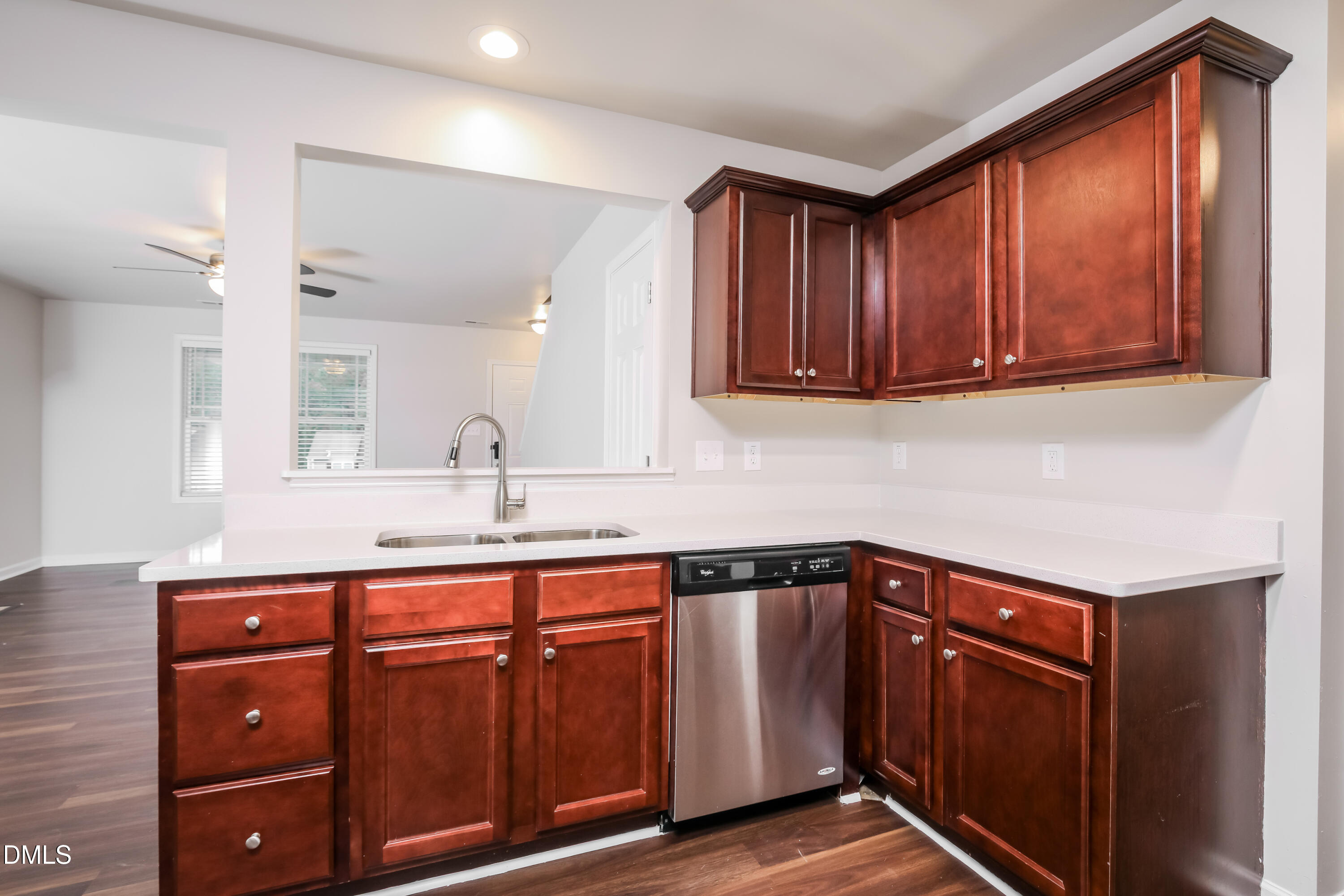 195 Cherryhill Drive Four Oaks, NC 27524 - Photo 6 of 17 a kitchen with sink and cabinets