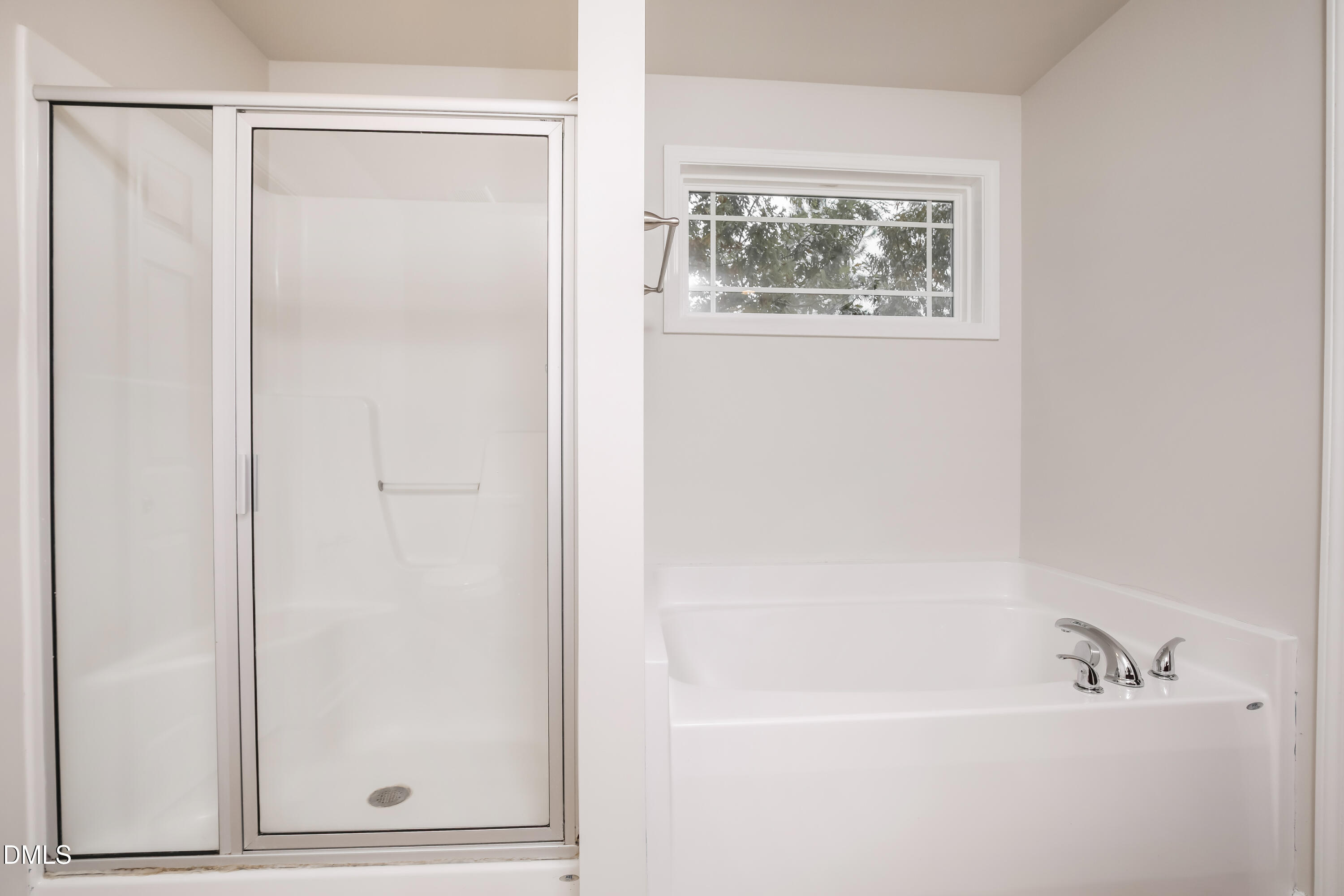 195 Cherryhill Drive Four Oaks, NC 27524 - Photo 10 of 17 a bathroom with bathtub and shower