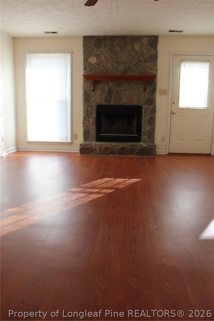 7805 Gallant Ridge Drive Fayetteville, NC 28314 - Photo 6 of 25 a view of empty room with window and fireplace