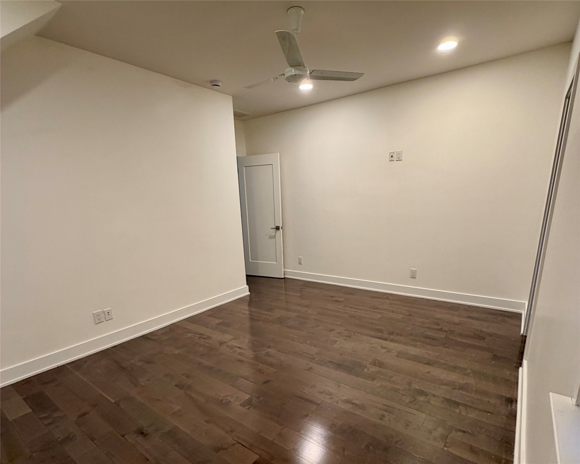 1515 Hether Street, Unit B Austin, TX 78704 - Photo 13 of 30 Rich hardwood floors complement neutral walls in this inviting, spacious bedroom.