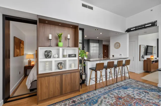 a view of living room with furniture and window