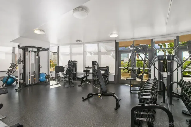 a view of a balcony with furniture