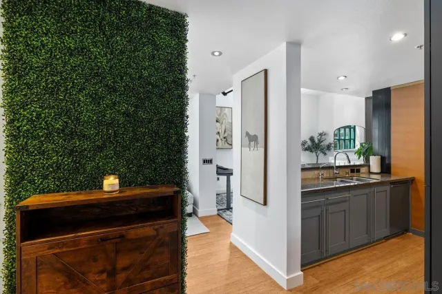 a kitchen with a sink and cabinets