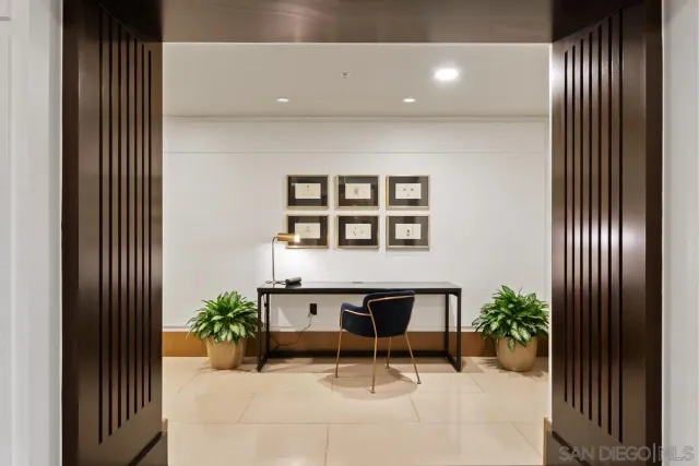 a kitchen with refrigerator and stove