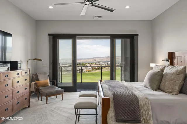 a bathroom with a granite countertop sink a mirror a bathtub and shower