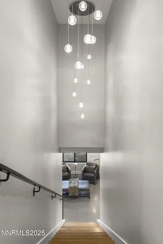 a kitchen with stainless steel appliances kitchen island granite countertop a refrigerator and a sink