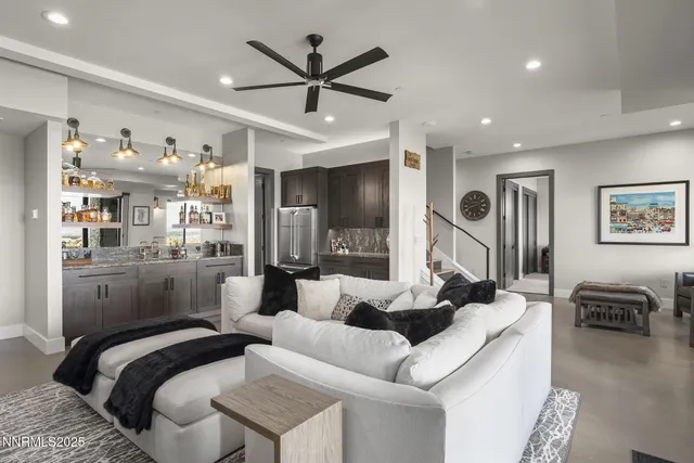 a view of a balcony with lake view and wooden floor