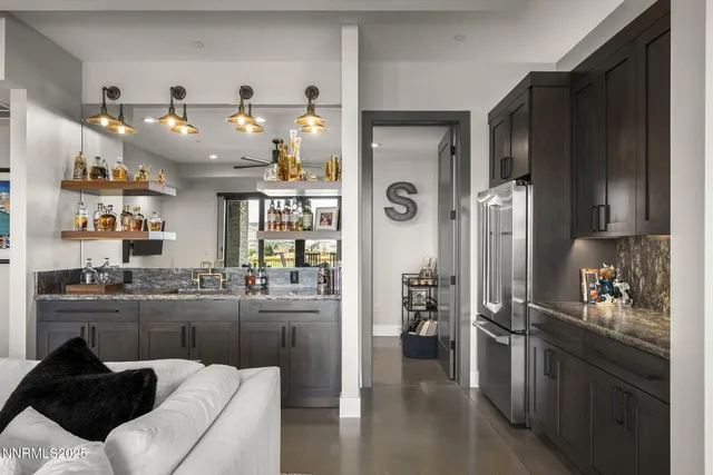 a view of backyard with outdoor seating