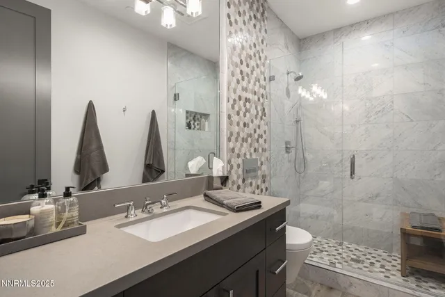 a view of swimming pool with a lounge chair