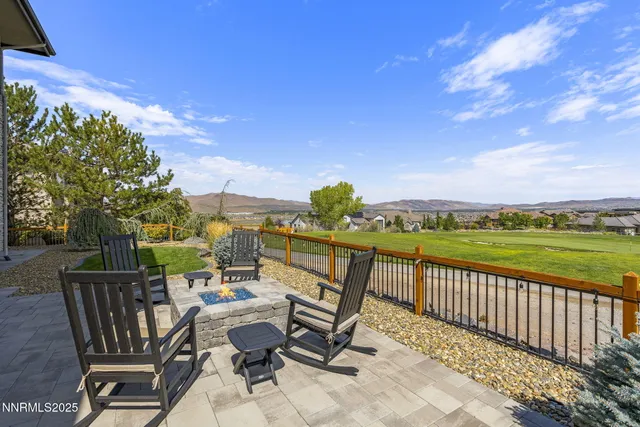 an aerial view of a garden with lawn chairs