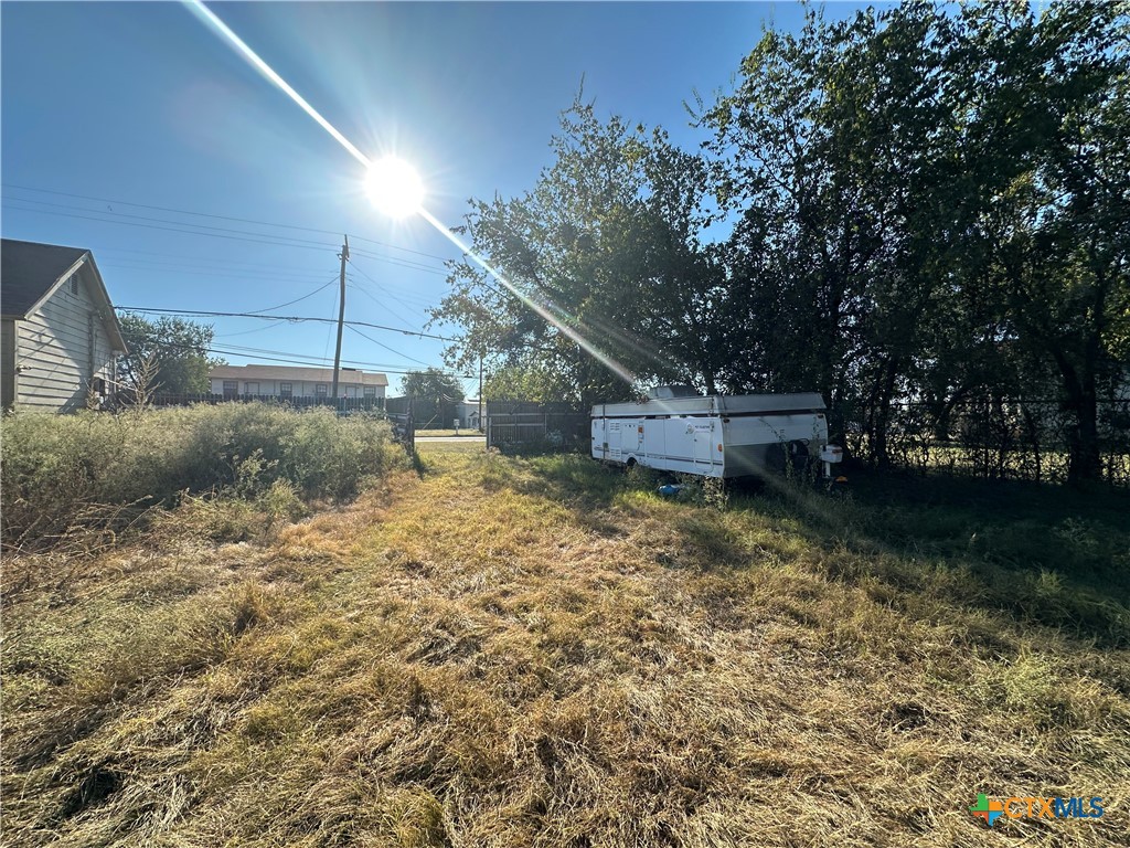 405 North Main Street Copperas Cove, TX 76522 - Photo 11 of 16 a view of a backyard with trees