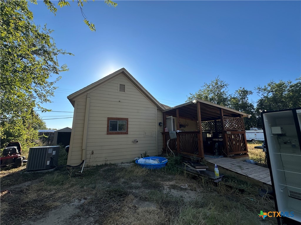 405 North Main Street Copperas Cove, TX 76522 - Photo 14 of 16 a view of a house with backyard and trees