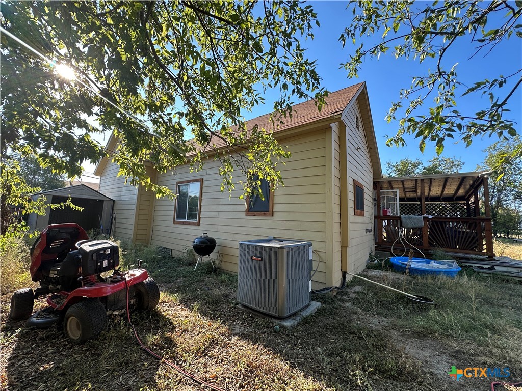 405 North Main Street Copperas Cove, TX 76522 - Photo 15 of 16 a view of a house with backyard and sitting area