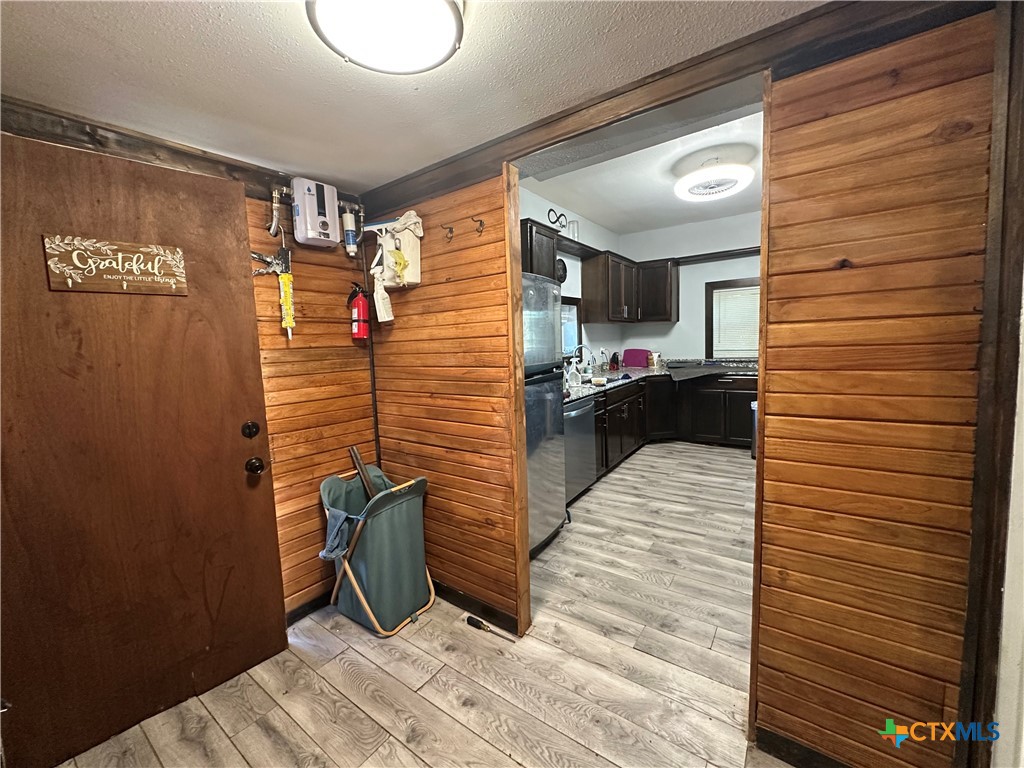 405 North Main Street Copperas Cove, TX 76522 - Photo 4 of 16 a bathroom with a sink and a mirror