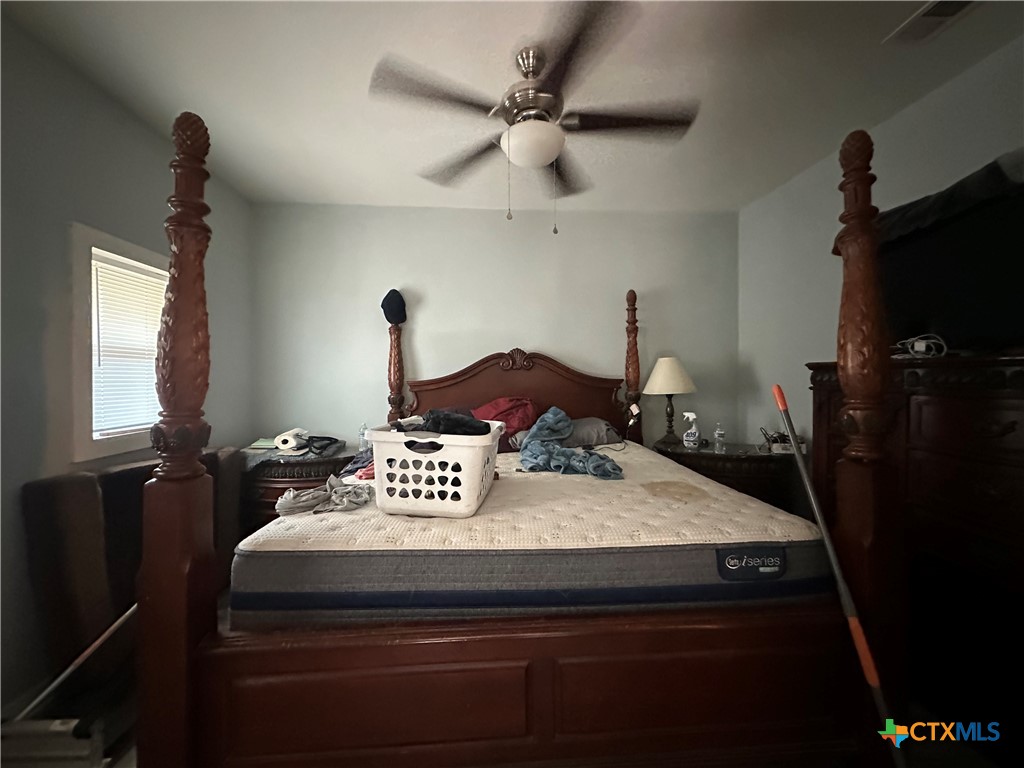 405 North Main Street Copperas Cove, TX 76522 - Photo 7 of 16 a bathroom with a sink and a mirror