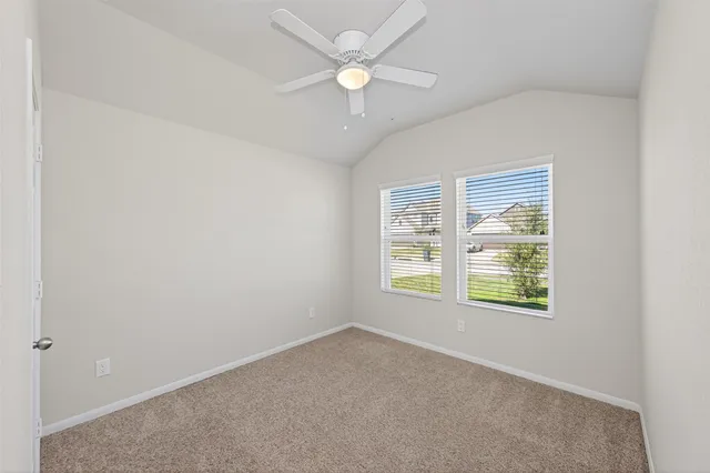 an empty room that has a window