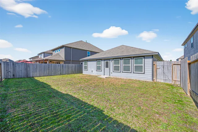 a view of a backyard with a garden