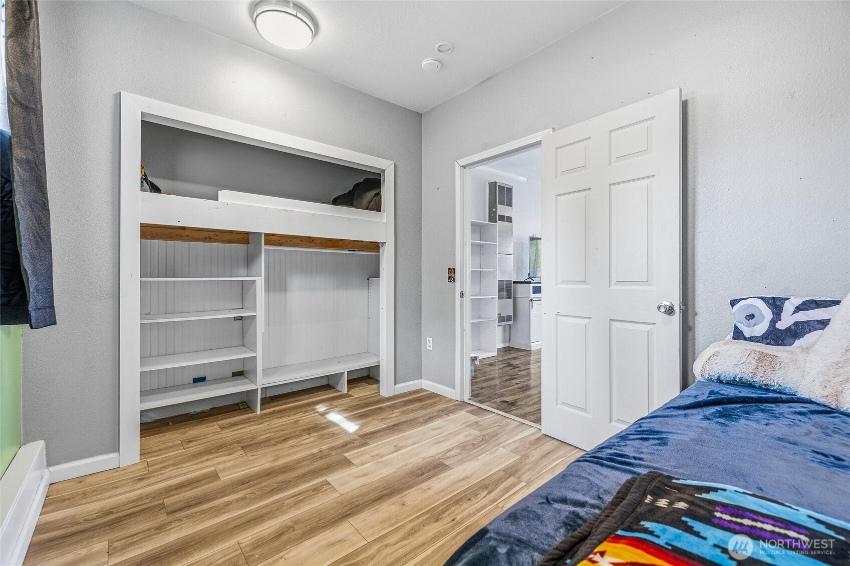 113 South Gardner Road Burlington, WA 98233 - Photo 17 of 40 a bedroom with a bed and a view of closet