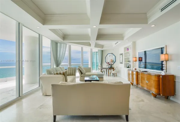 a dining room with table and chairs