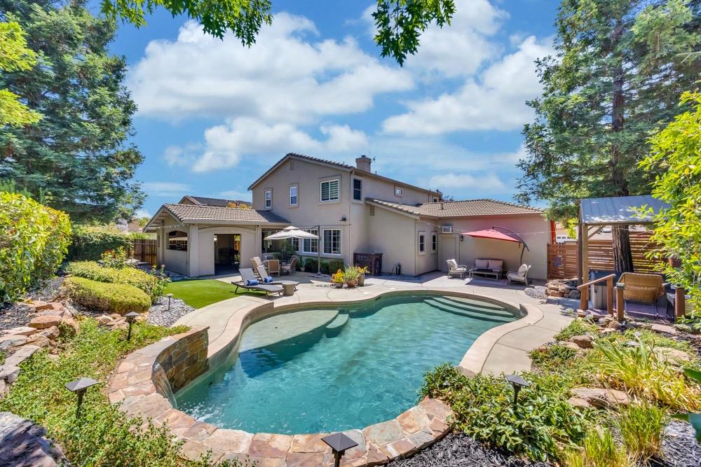 1065 Mallard Circle Folsom, CA 95630 - Photo 1 of 1 a view of a house with swimming pool and sitting area
