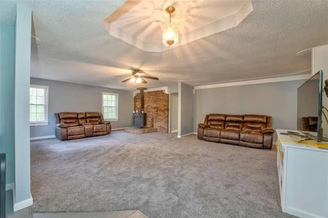 a kitchen with stainless steel appliances granite countertop a stove a sink and a granite counter tops