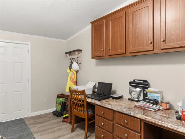 a kitchen with stainless steel appliances granite countertop a sink dishwasher stove and cabinets