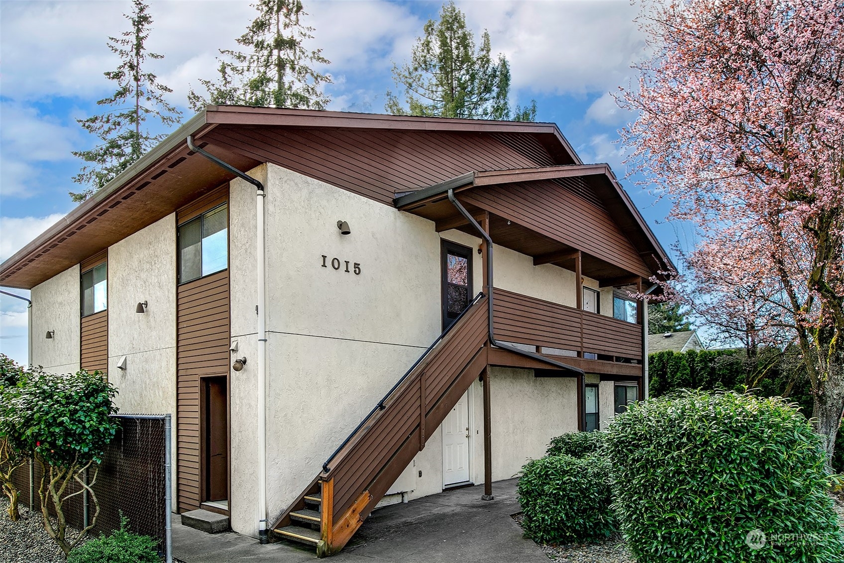 a house with trees in the background