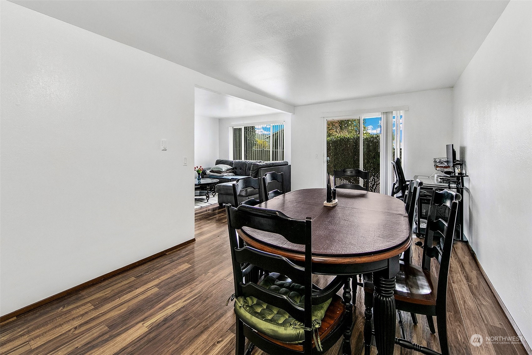 1015 Southwest 149th Street Burien, WA 98166 - Photo 12 of 31 a view of a dining room with furniture and wooden floor